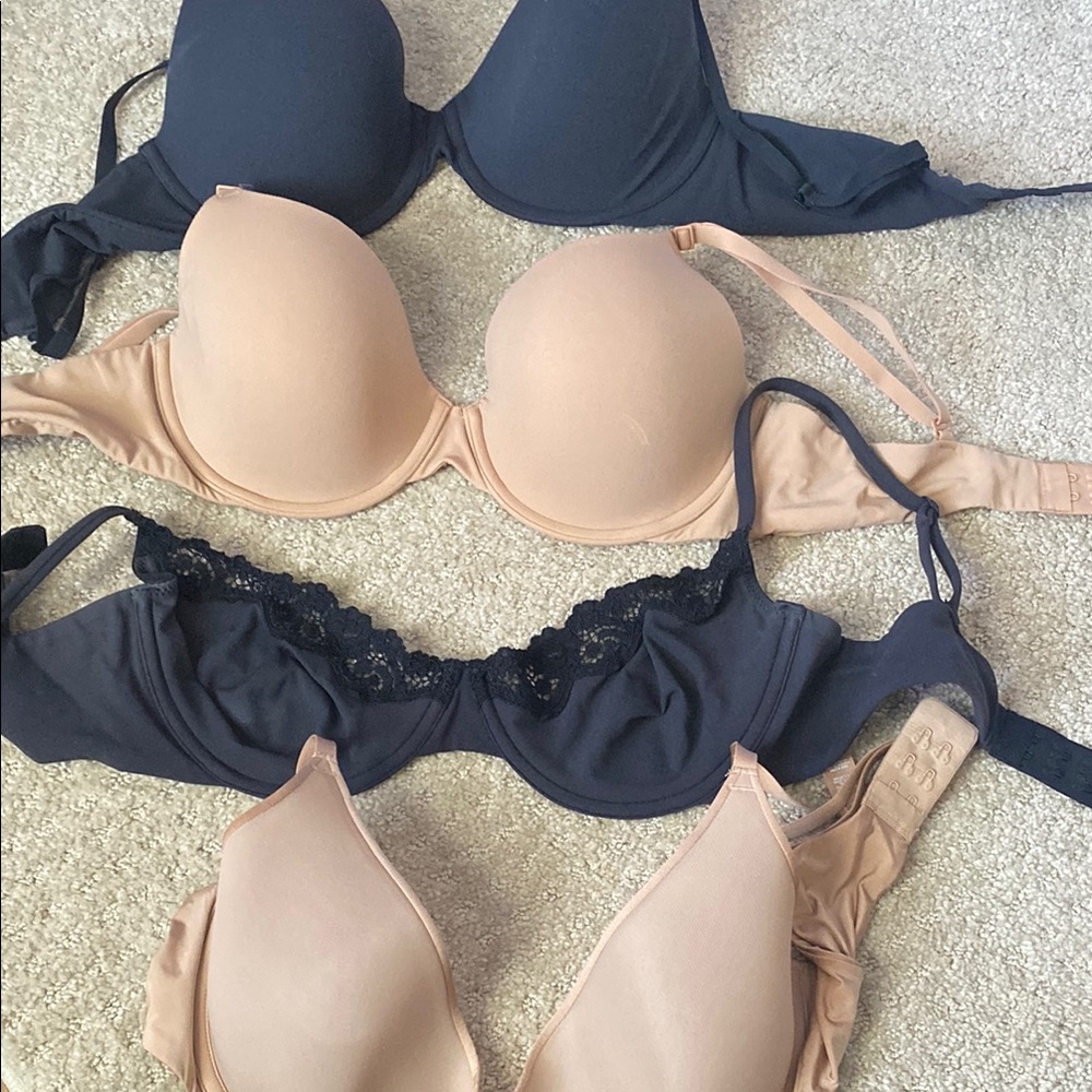 Four SKIMS bras size 36c